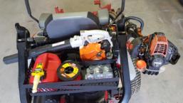 Attaches to Zeroturn mower to carry a handheld blower with other things such as extra fuel, trimmer string, gloves
